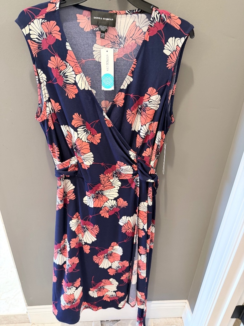 Sleeveless faux wrap midi sundress in floral print.